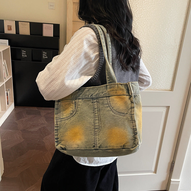 Denim-inspirierte Mehrfach-Taschen Tote Bag