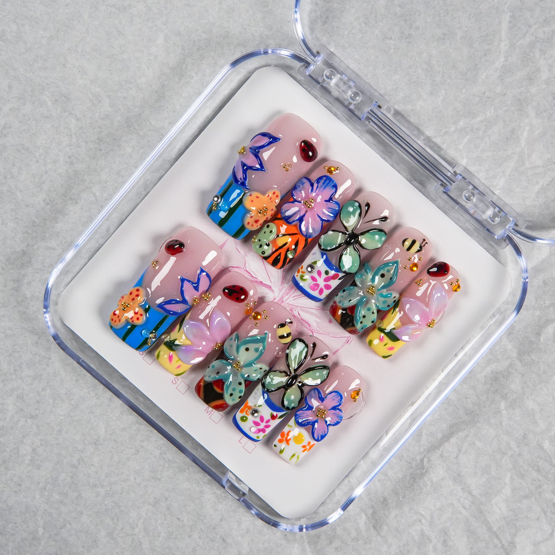 Künstlerisches Press-On-Nagelset mit buntem Design