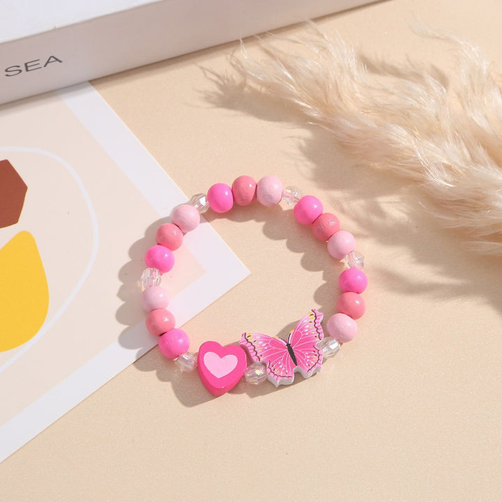 Verspieltes Armband mit Herz- und Schmetterlings-Anhängern Karnz