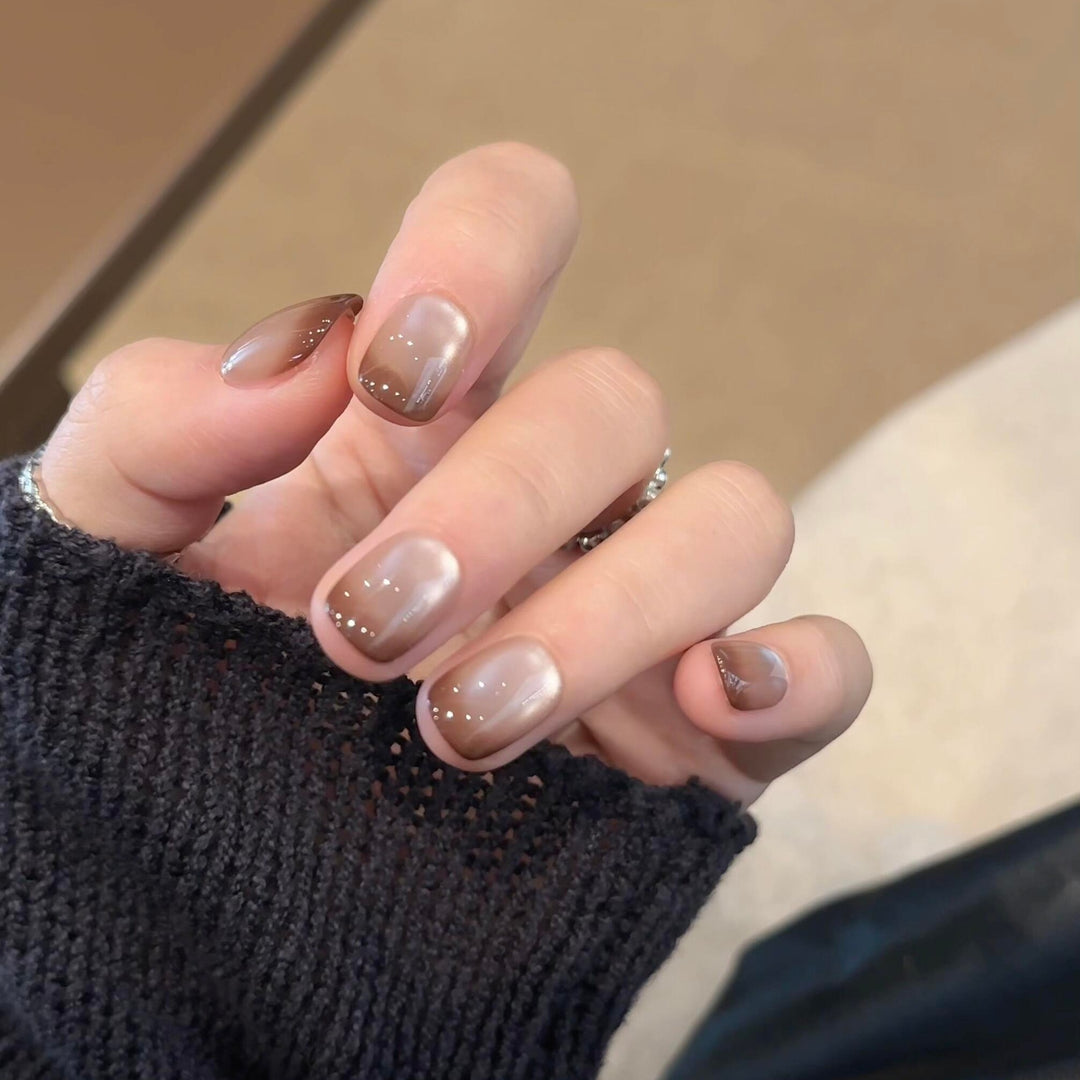 Kunstnägel mit Elegantem Farbverlauf und Glitzerelementen Karnz