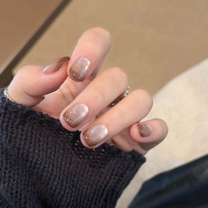 Kunstnägel mit Elegantem Farbverlauf und Glitzerelementen Karnz