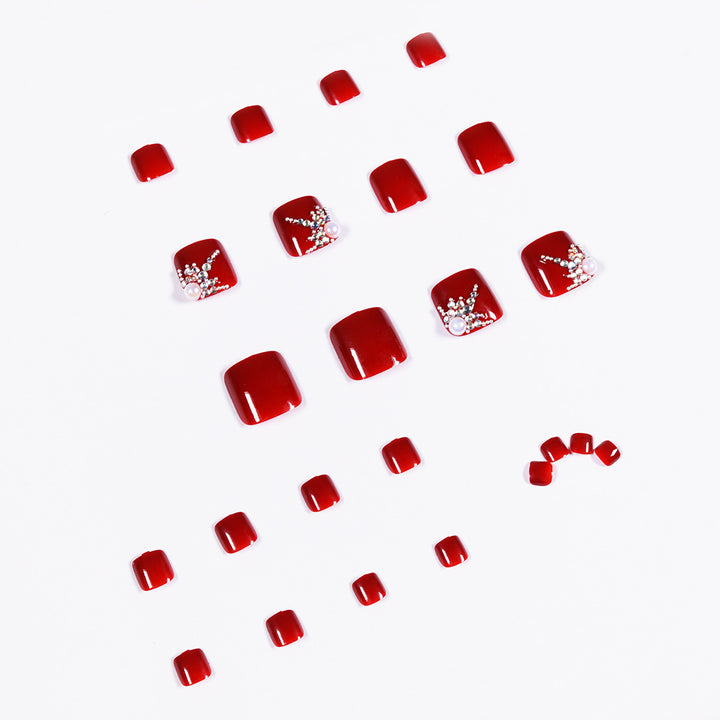 Kunstvolle Fußnagelgestaltung mit elegantem Strass-Design Karnz