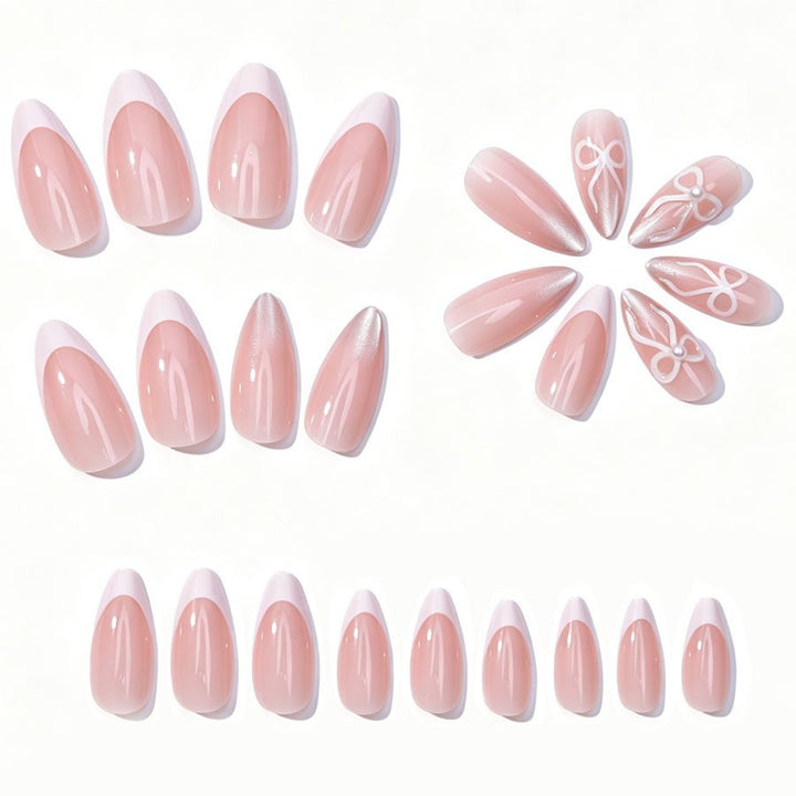 Kunstnagelset mit eleganten Spitzen und Glitzerakzenten Karnz