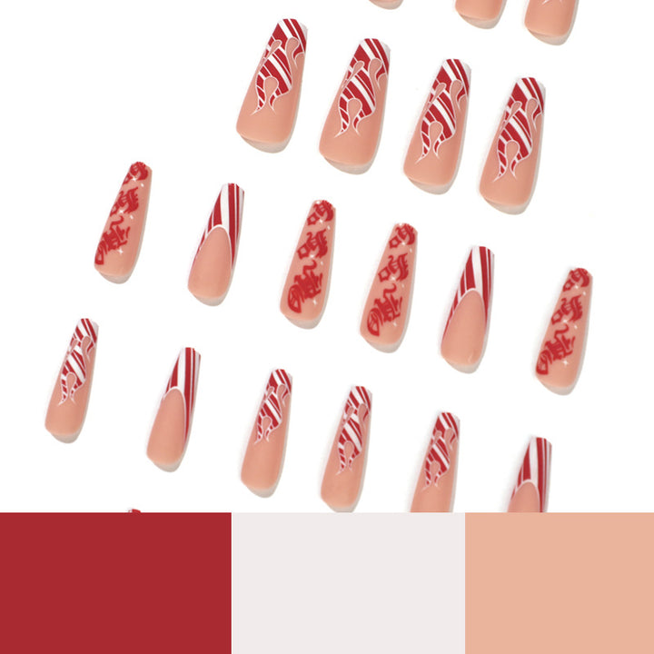 Künstlerische Nagelverlängerungen im festlichen Design Karnz