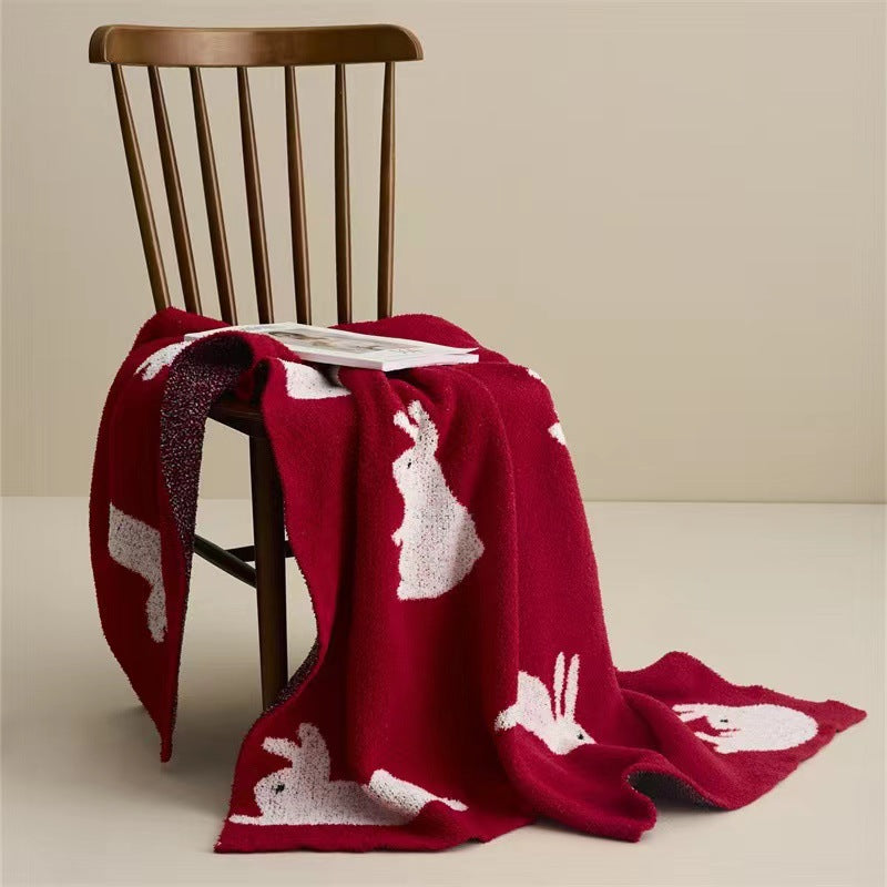 Kuscheldecke aus Jacquardstrick mit Hasenmotiven Karnz