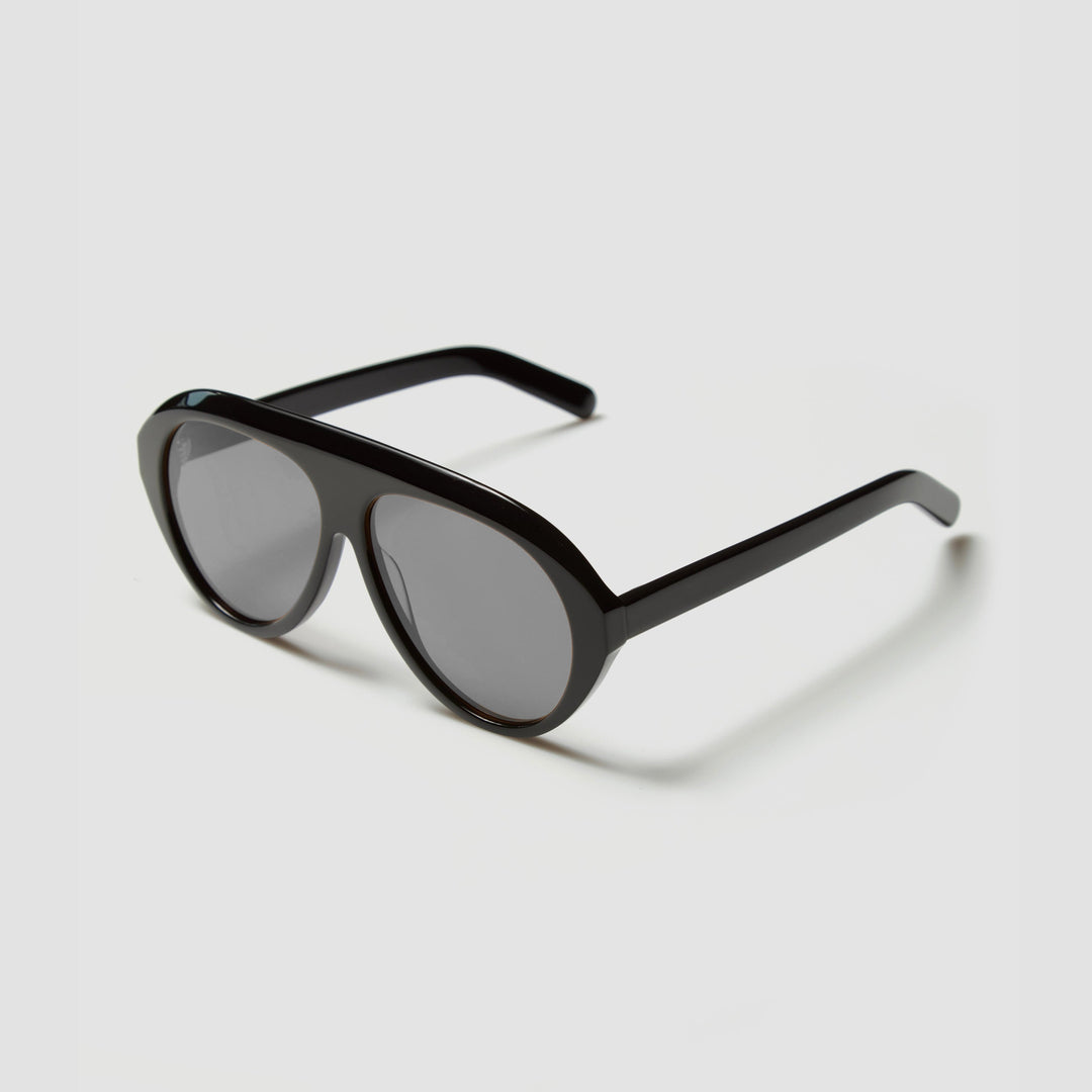 Damen Statement Sonnenbrille mit breitem Rahmen und grünen Gläsern Karnz
