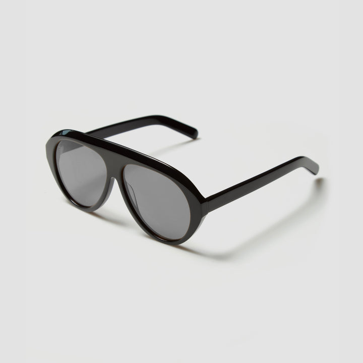 Damen Statement Sonnenbrille mit breitem Rahmen und grünen Gläsern Karnz