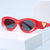 Damen Retro-inspirierte Sonnenbrille mit markanten Akzenten Karnz