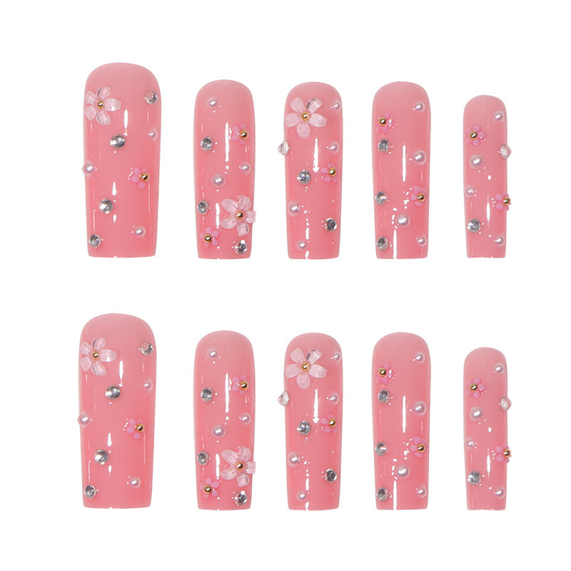 Dekoratives Langes Press-On-Nagelset mit Floralen Akzenten Karnz