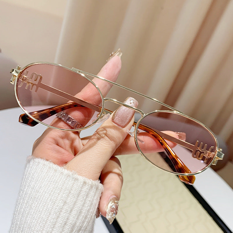 Damen modische Brille mit elegantem Metallrahmen und einzigartigem Design Karnz