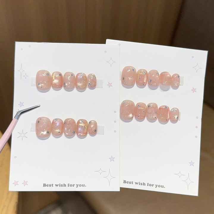 Glamouröse Kunstnagelspitzen mit Sternen Design Karnz