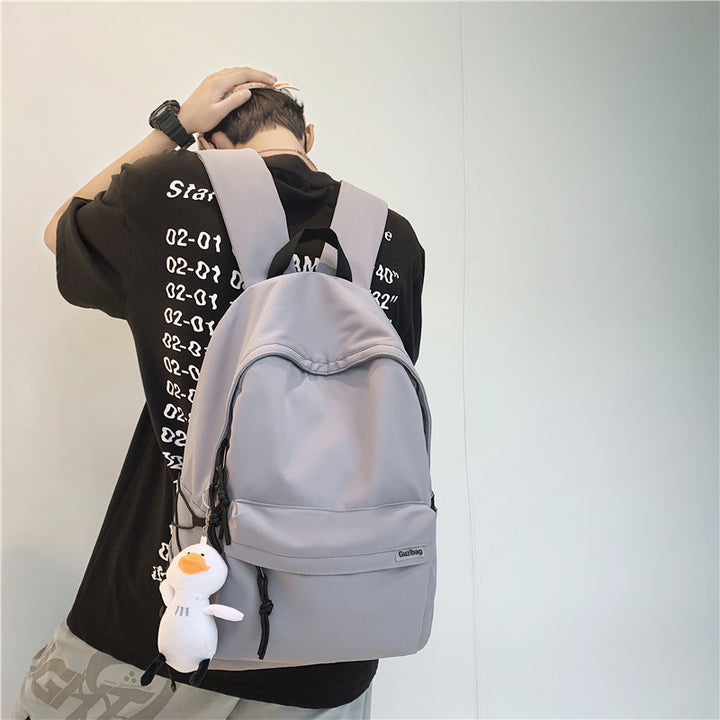 Vielseitiger lässiger Rucksack mit Plüsch Charm Karnz