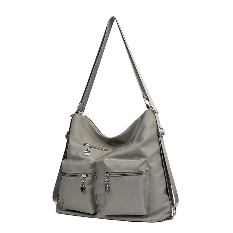 Geräumige Mehrfachtaschen-Schultertasche Karnz