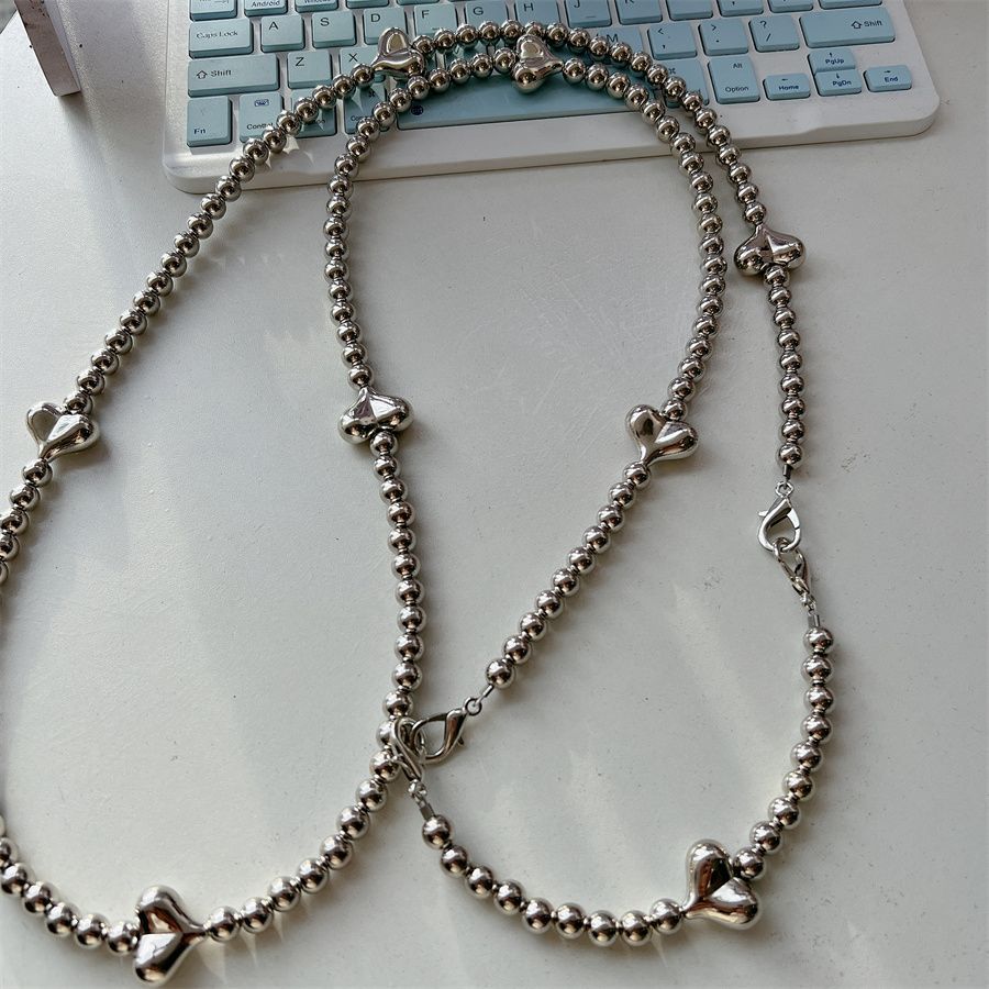 Stylische Herz-Akzent Perlen-Brillenband Karnz