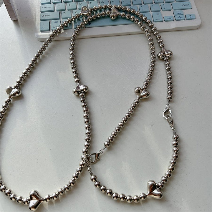Stylische Herz-Akzent Perlen-Brillenband Karnz