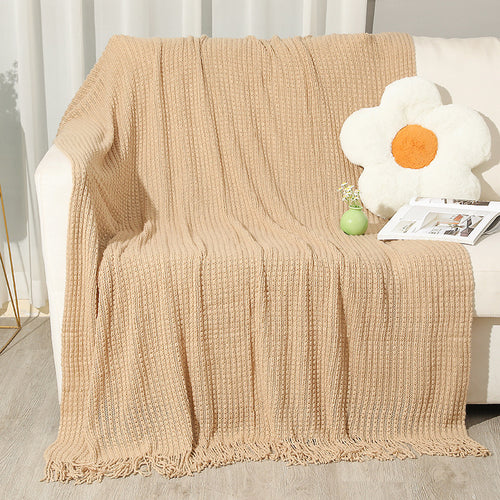 Strukturierte Strickwurfdecke