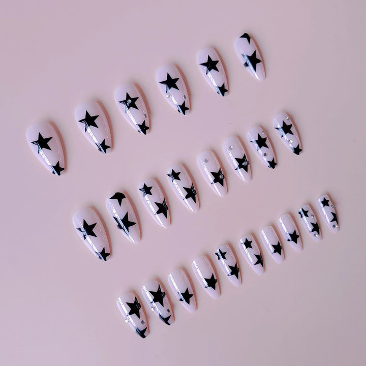 Stern-beschmückte Stiletto-Nagelkunst-Erweiterungen Karnz