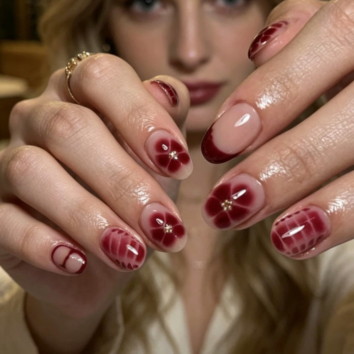 Elegante Kunstnägel mit Floralem Design und Glanz Karnz