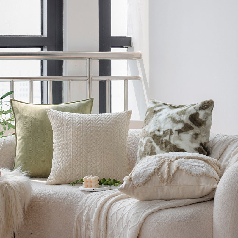 Dekoratives Kissen mit pflanzlichem Design