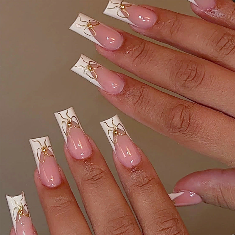 Dekorativer Press-On Nail Set mit künstlerischen Schleifen Designs Karnz