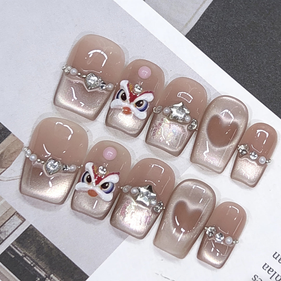 Künstlerisches Press-On Nagelkunstset mit Herz- und Edelsteinakzenten Karnz