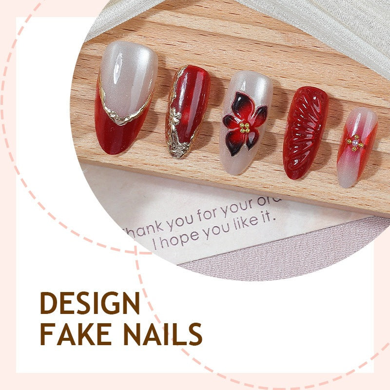 Kunstnagelset mit floralem Design und eleganten Glitzerdetails Karnz