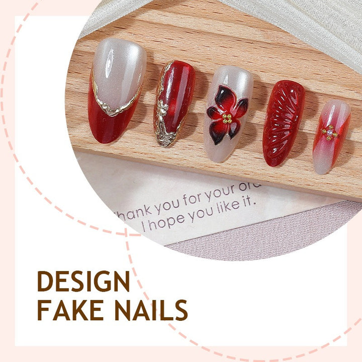 Kunstnagelset mit floralem Design und eleganten Glitzerdetails Karnz