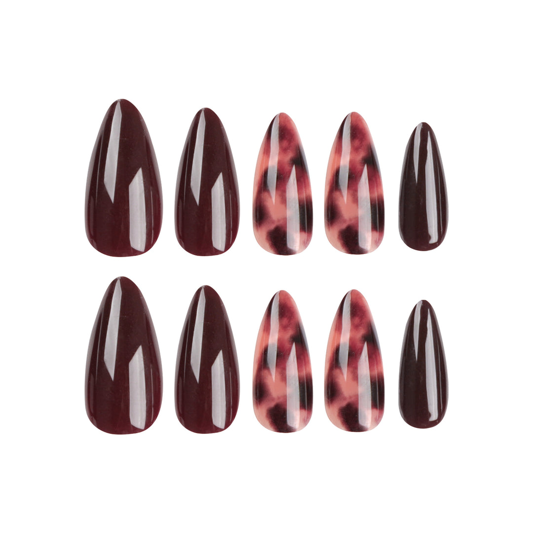 Elegante Stiletto-Nägel mit tierischem Design Karnz