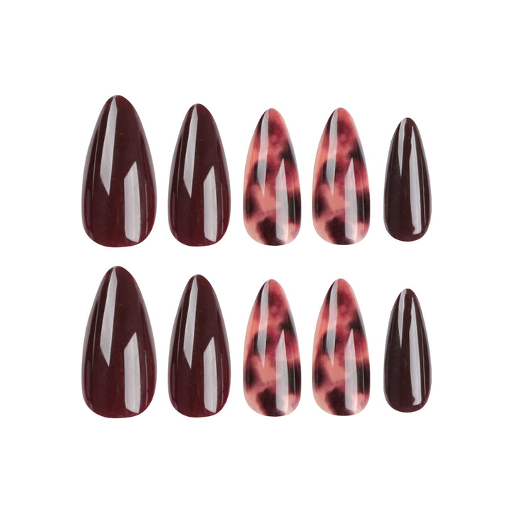 Elegante Stiletto-Nägel mit tierischem Design Karnz