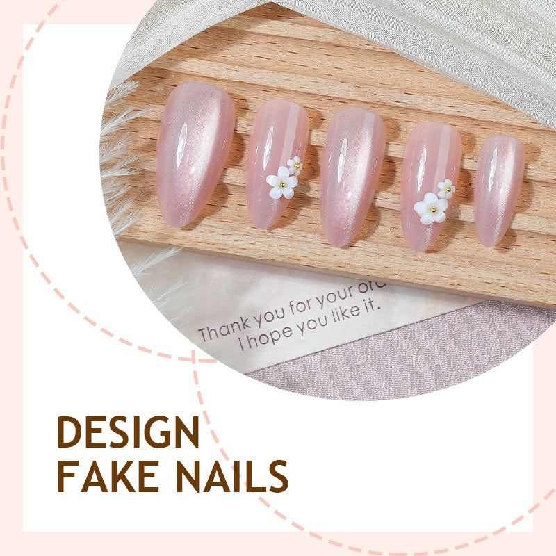 Kunstnagelset mit eleganten Blütenmotiven Karnz