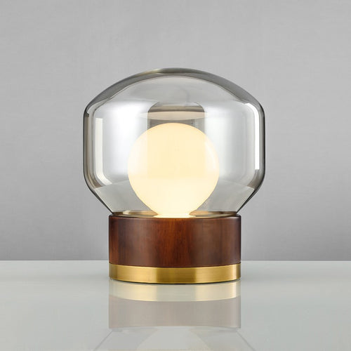Moderne Glas Tischlampe mit Holzfuß und goldenen Akzenten