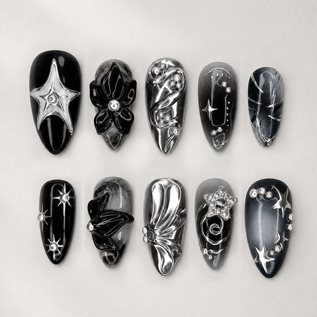 Kunstnagelset mit glamoureusen Designs und einzigartigen 3D-Elementen Karnz