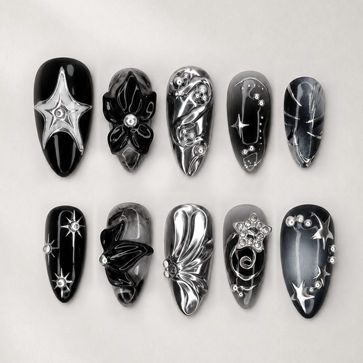 Kunstnagelset mit glamoureusen Designs und einzigartigen 3D-Elementen Karnz