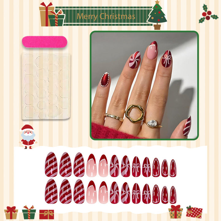 Kunstnagelset mit festlichen Weihnachtsmotiven und glamourösen Verzierungen Karnz