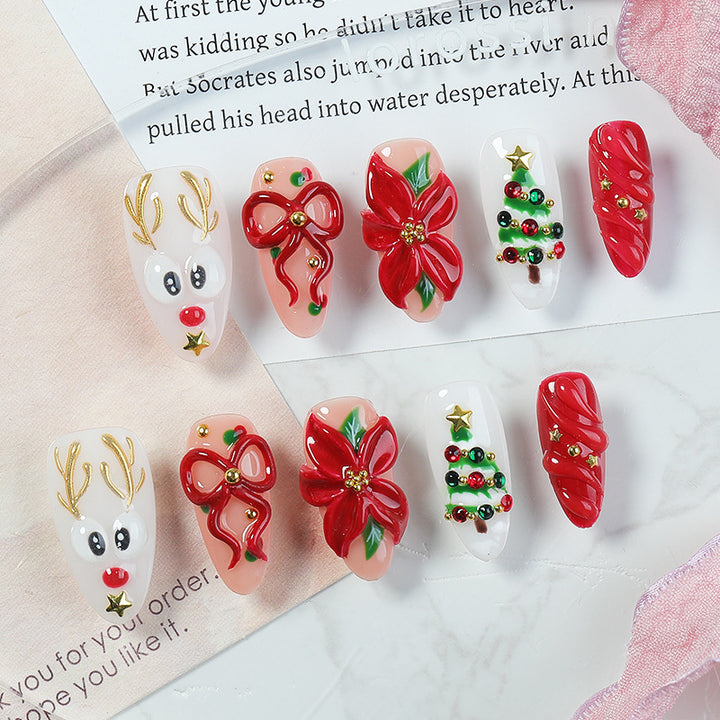 Kreatives Weihnachtskunstnagelset mit festlichen Motiven und Glitzerakzenten Karnz