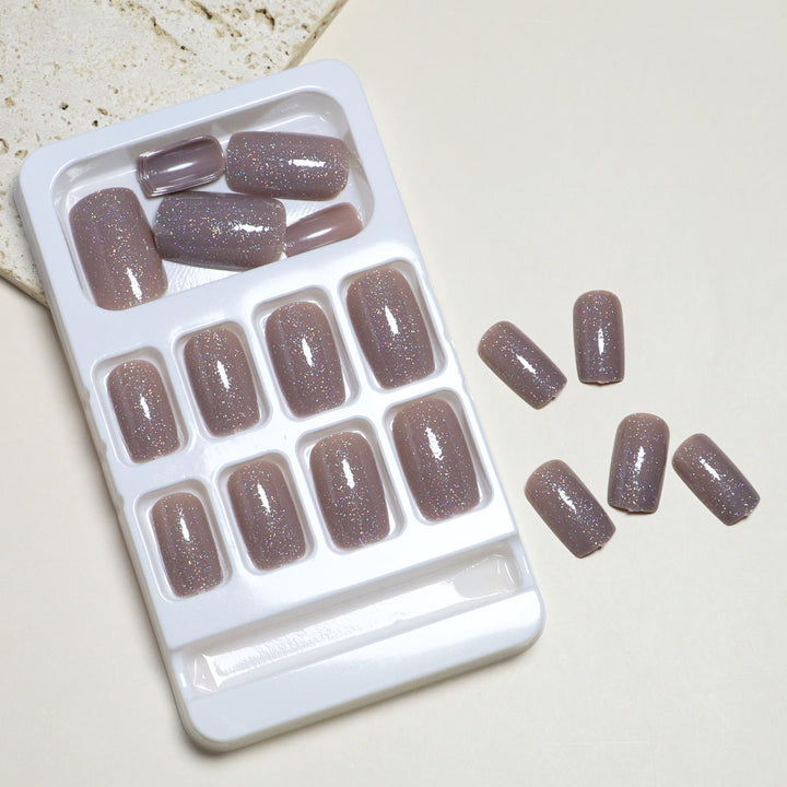 Glitzerhaltiges Press-On Nagelset Karnz