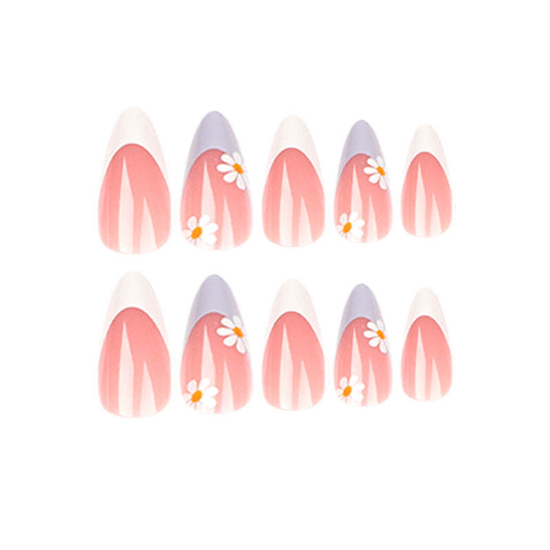 Elegante Kunstnagelgestaltung mit zarten Blüten- und Ombre-Effekten Karnz