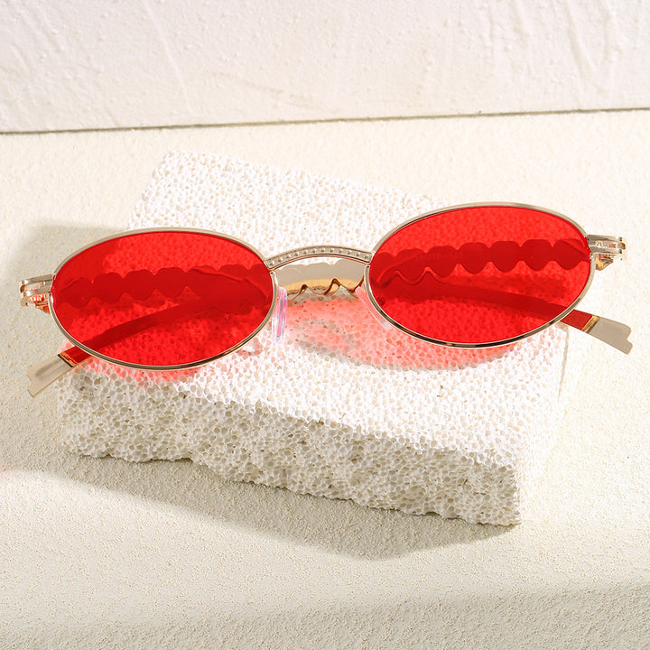 Modische Sonnenbrille mit Ovalem Rahmen und Luxuriösem Akzent Karnz