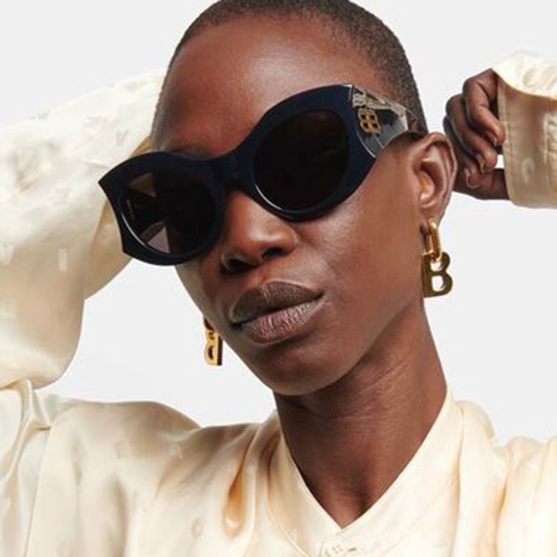 Damen stilvolle Cat-Eye Sonnenbrille mit hochglänzendem Design und schützenden Gläsern Karnz