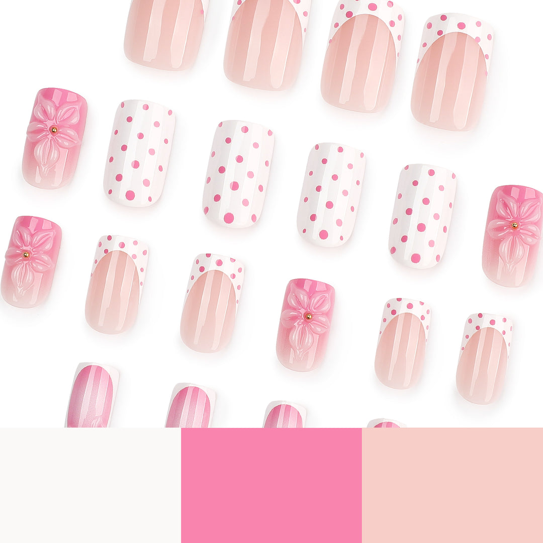 Künstliche Nagelkunst mit trendy Blumendekor und Punkten Karnz