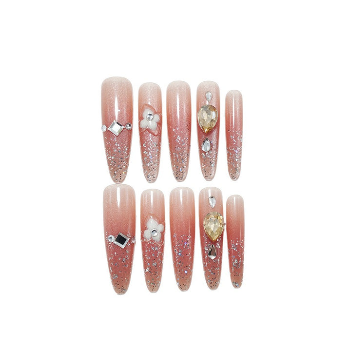 Glänzende Kunstnägel mit Strass und Glitter Karnz