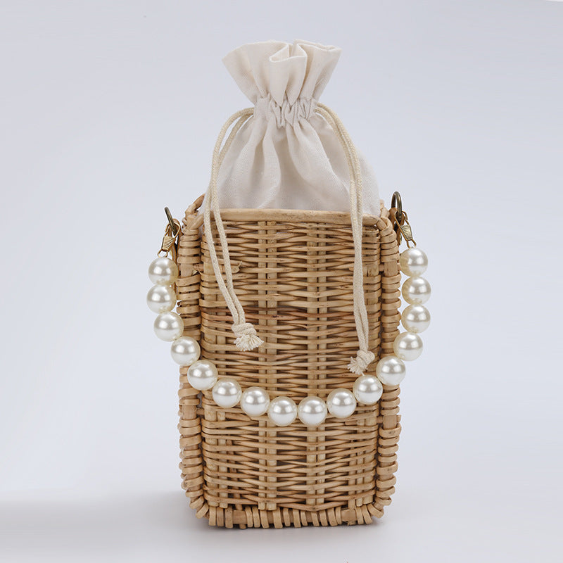 Damen Handtasche aus geflochtenem Material mit Perlenakzenten Karnz