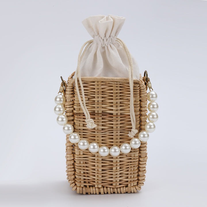 Damen Handtasche aus geflochtenem Material mit Perlenakzenten Karnz