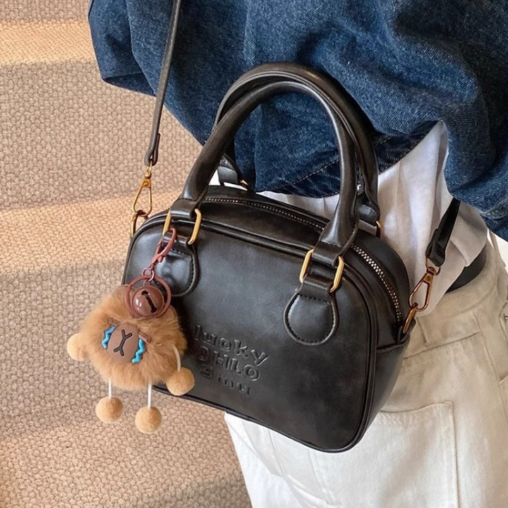 Schlanke strukturierte Mini-Schultertasche Karnz