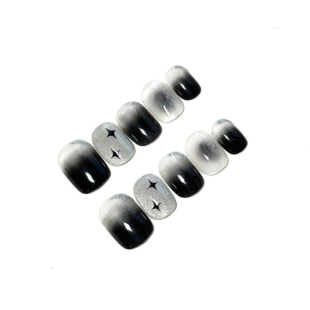 Künstlerisches Ombre Press-On Nagelset mit Sternakzenten