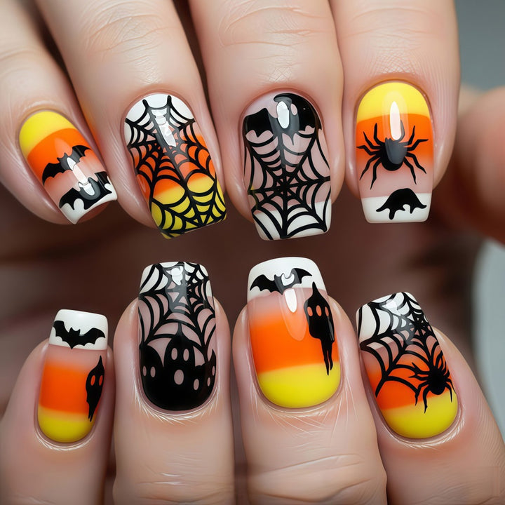 Kunstnägel im kreativen Halloween-Stil mit Spinnen- und Fledermausmotiven Karnz