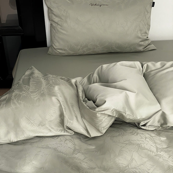 Premium-Satin-Bettwäschegarnitur mit geprägtem Monstera-Blattrelief und knitterarmem Finish