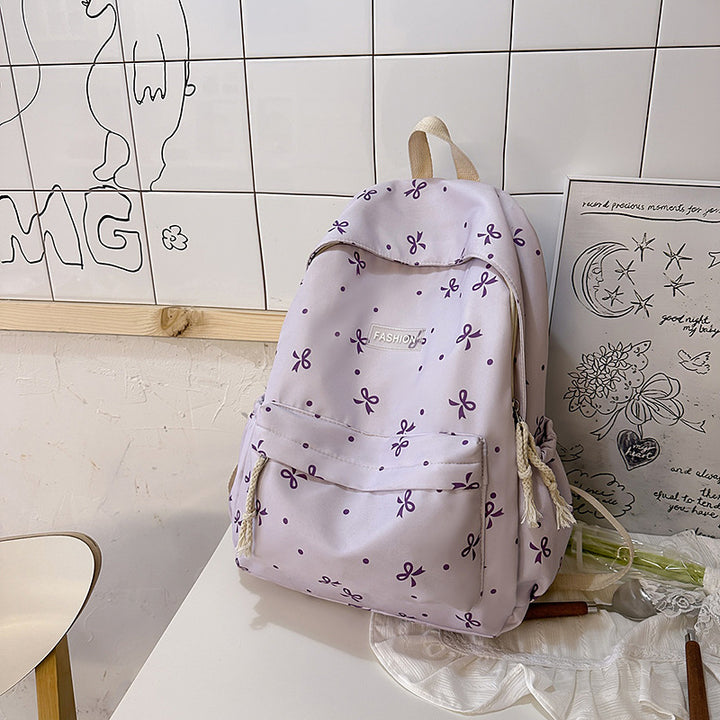 Verspielt gemusterter Rucksack