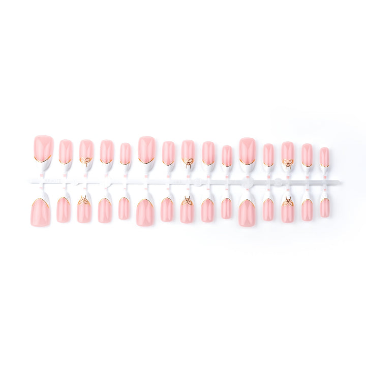 Elegantes French Tip Press-On Nagelkunstset mit goldenen Akzenten Karnz