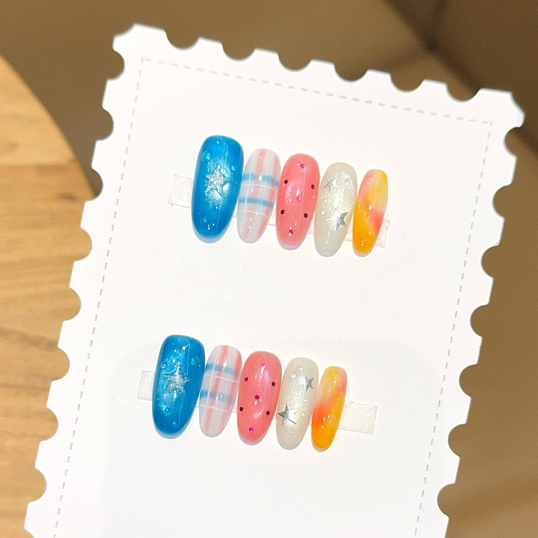 Kreatives Kunstnagelset mit Glitzer- und Sternendesign Karnz